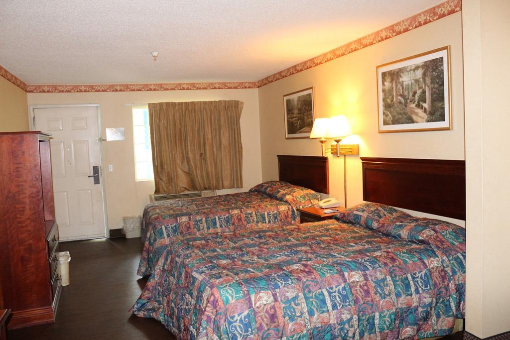 Magnolia Bay Hotel & Suites Джонсборо Экстерьер фото